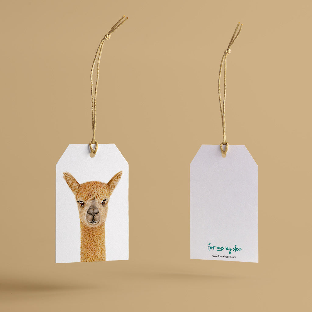 alpaca wild animal gift tag with twine string on mustard background