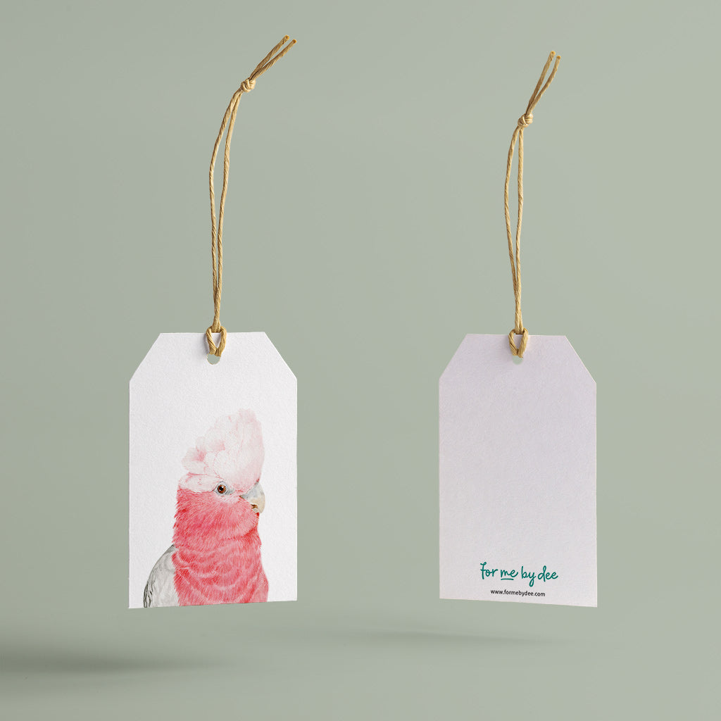 galah australian bird gift tag with twine string on green background