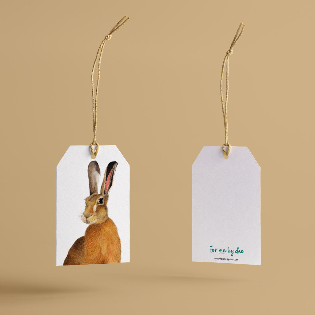 hare wild animal gift tag with twine string on mustard background