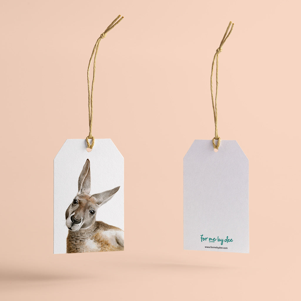 kangaroo australian animal gift tag with twine string on pink background