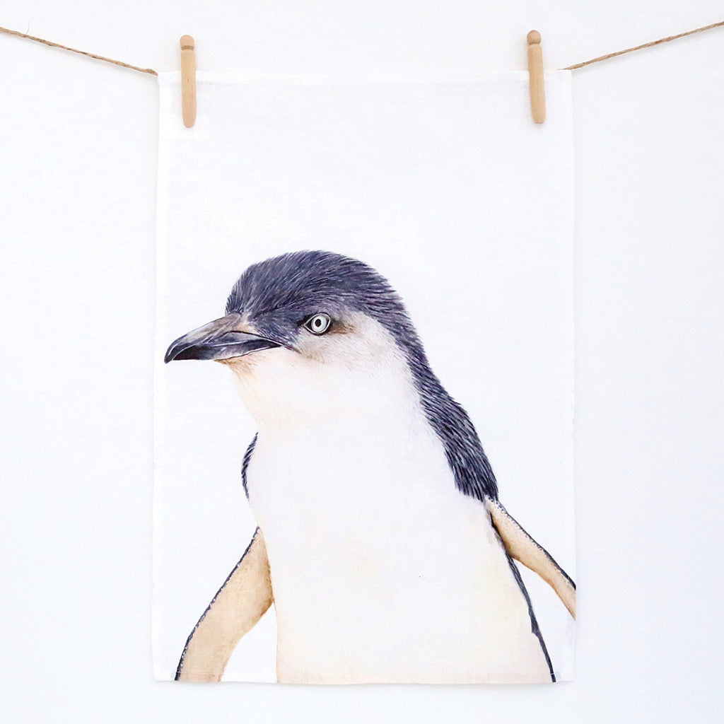 white linen tea towel with little fairy penguin watercolour artwork