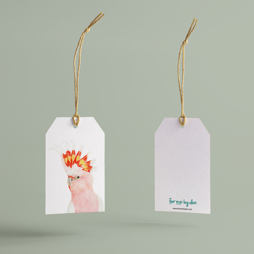 major mitchells cockatoo australian bird gift tag with twine string on green background