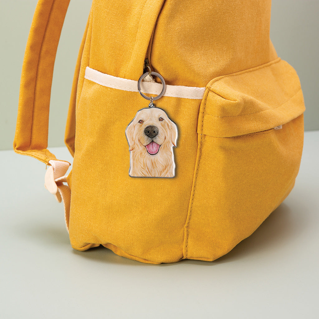 golden retriever dog watercolour artwork enamel keychain on yellow canvas backpack