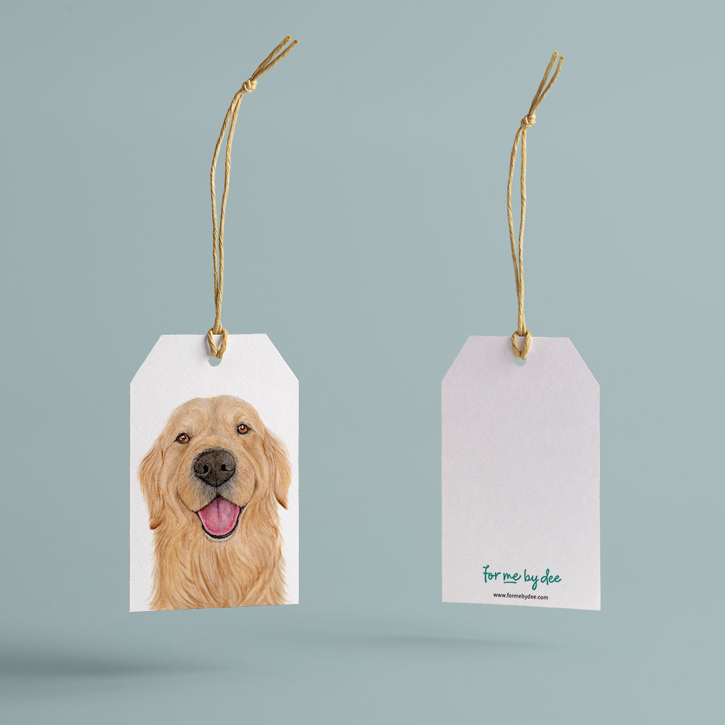 golden retriever dog gift tag with twine string on blue background